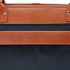 Felisiを象徴するイタリア製ナイロンとバケッタレザーのコンビネーション